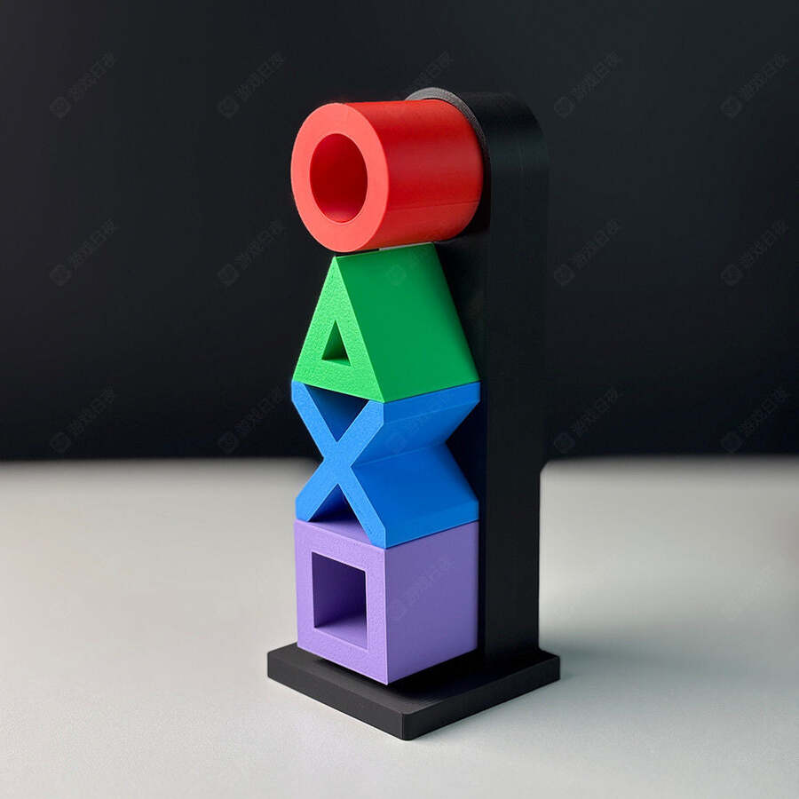 حامل سماعات رأس مطبوع بتقنية 3D مستوحى من رموز بلايستيشن الشهيرة (○ △ × □)،